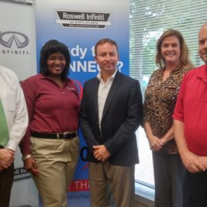 Bonnie Mauldin with The Mauldin Group, Jack Tuszynski with Family Life Publications, and Kathy Guidry with Minuteman Press of Alpharetta