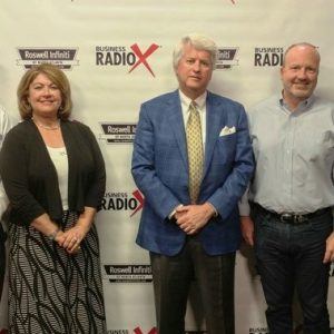 Steve Schilling with Digital Ignition, Roger Lusby with Frazier & Deeter, and Rose Sharif with Fidelity Bank