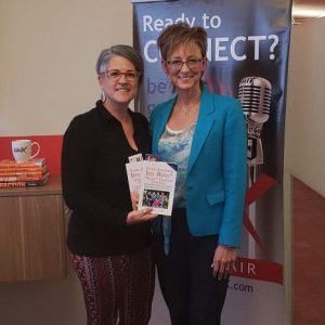 Author and Financial Planner Marie Burns with Paper Lifesavers and Focus Point Planning