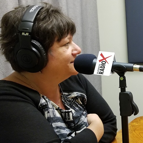 Abbie Fink of HMA Public Relations in the studio at Valley Business RadioX in Phoenix, AZ