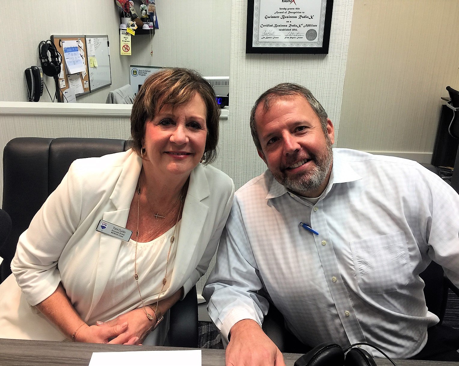 Toni Curtin with RE/MAX and Lee Blodgett with North Point Mortgage