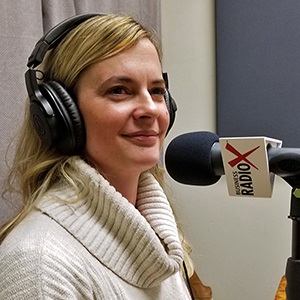 Dawn Albright with C + D Industry in the studio at Valley Business RadioX in Phoenix, Arizona
