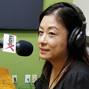 Helen Kim with Blue Lemon Productions in the studio at Valley Business RadioX in Phoenix, Arizona