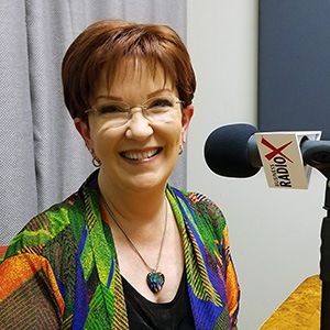 María Tomás-Keegan with Transition & Thrive with Maria in the studio at Valley Business RadioX in Phoenix, Arizona