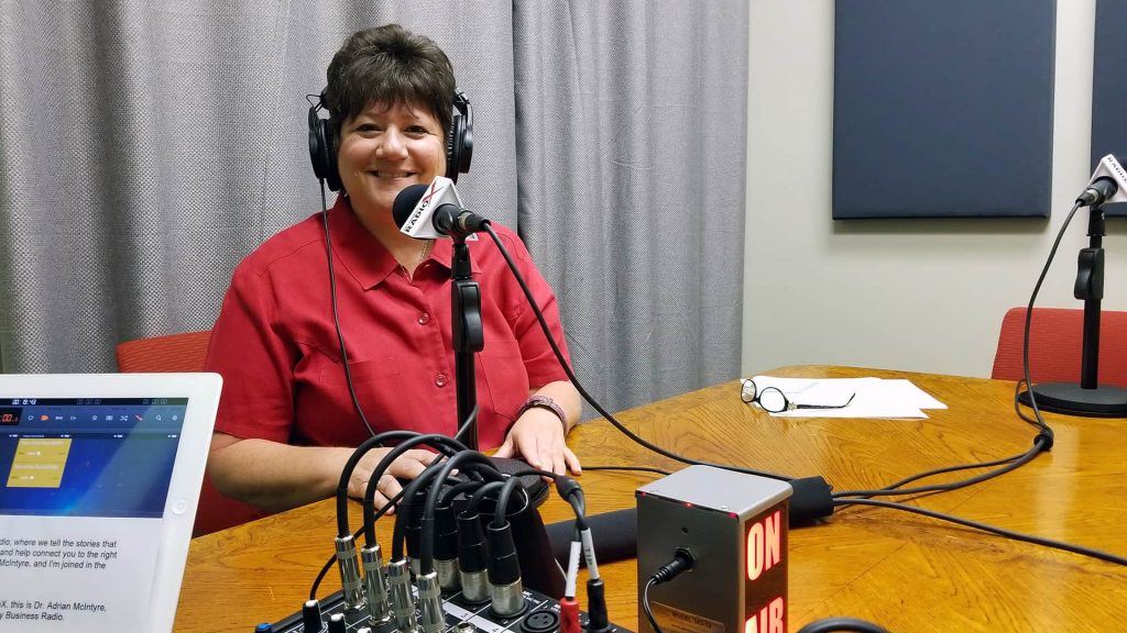 Abbie Fink with The Arizona 100 broadcasting live from the Valley Business RadioX studio in Phoenix, Arizona