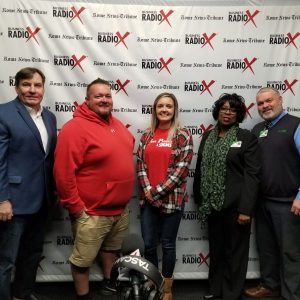Dan Bevels of Floyd Medical Center, Patsy Wade of Heyman Hospice Care at Floyd, Hannah White of Fast Printing and Signs, and Eric McJunkin of Brewhouse Music and Grill