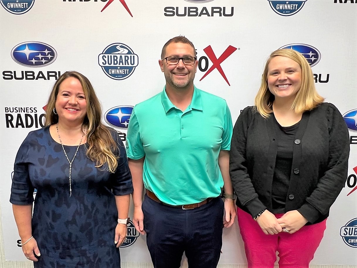 Heather Orrico with Comcast Business, Sara Orton with Aflac Cancer Center, and Benji Hollis with Chick-fil-A Peach Bowl