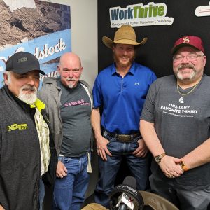 John Cloonan with Audacity Marketing, Bill Borden with High Caliber Realty and Professional Rodeo Rider Tim Pharr