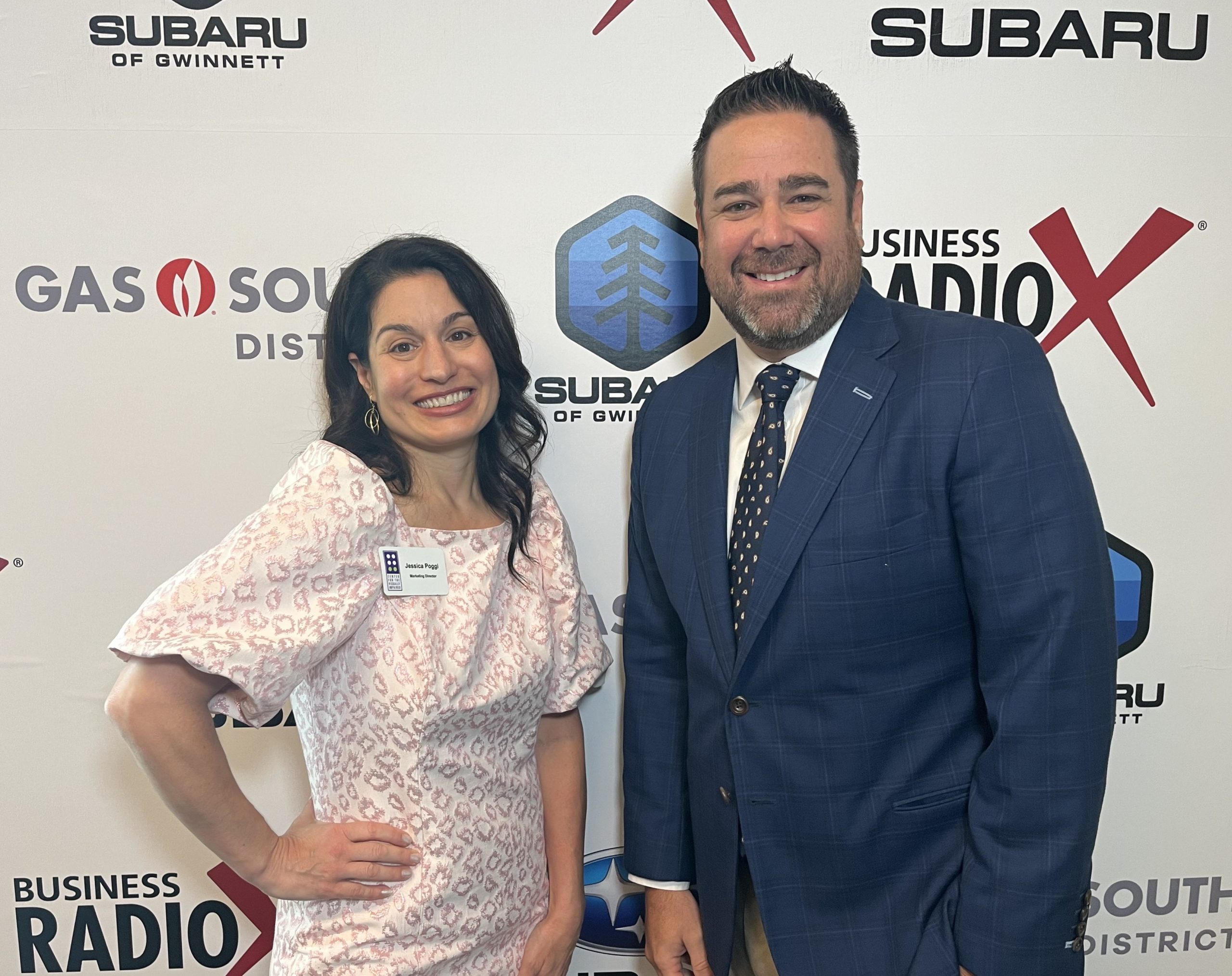 Mike O’Neill with Loyal Trust Bank and Jessica Poggi with Center for the Visually Impaired