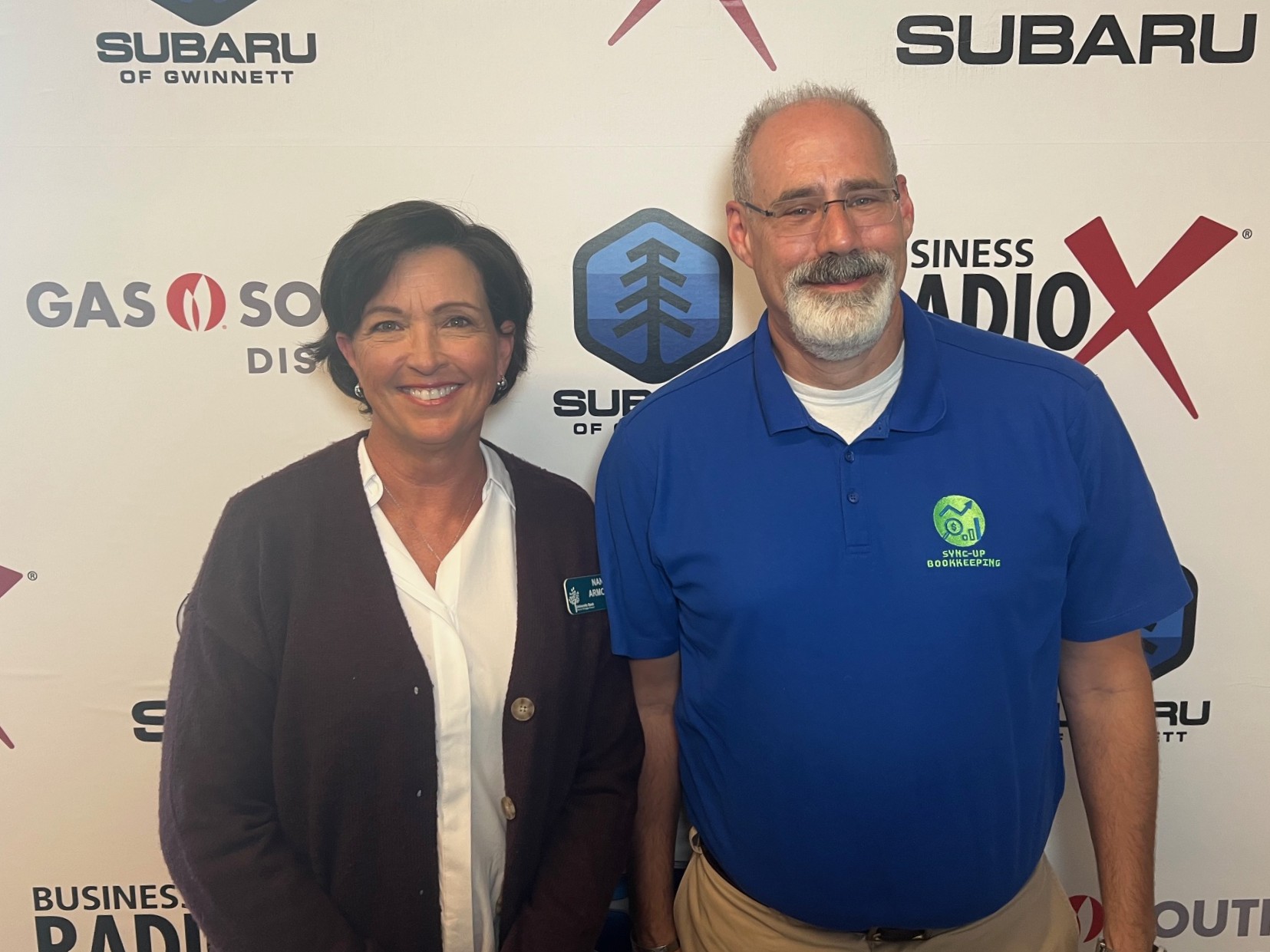 Ron Nocera with Sync-Up Bookkeeping and Nancy Armour with University Bank
