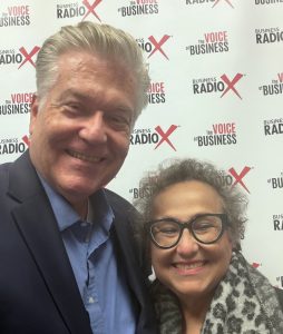 Host John Ray with Maria Fundora